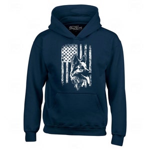 May include: Navy blue hooded sweatshirt with a white graphic of a German Shepherd dog in front of an American flag.