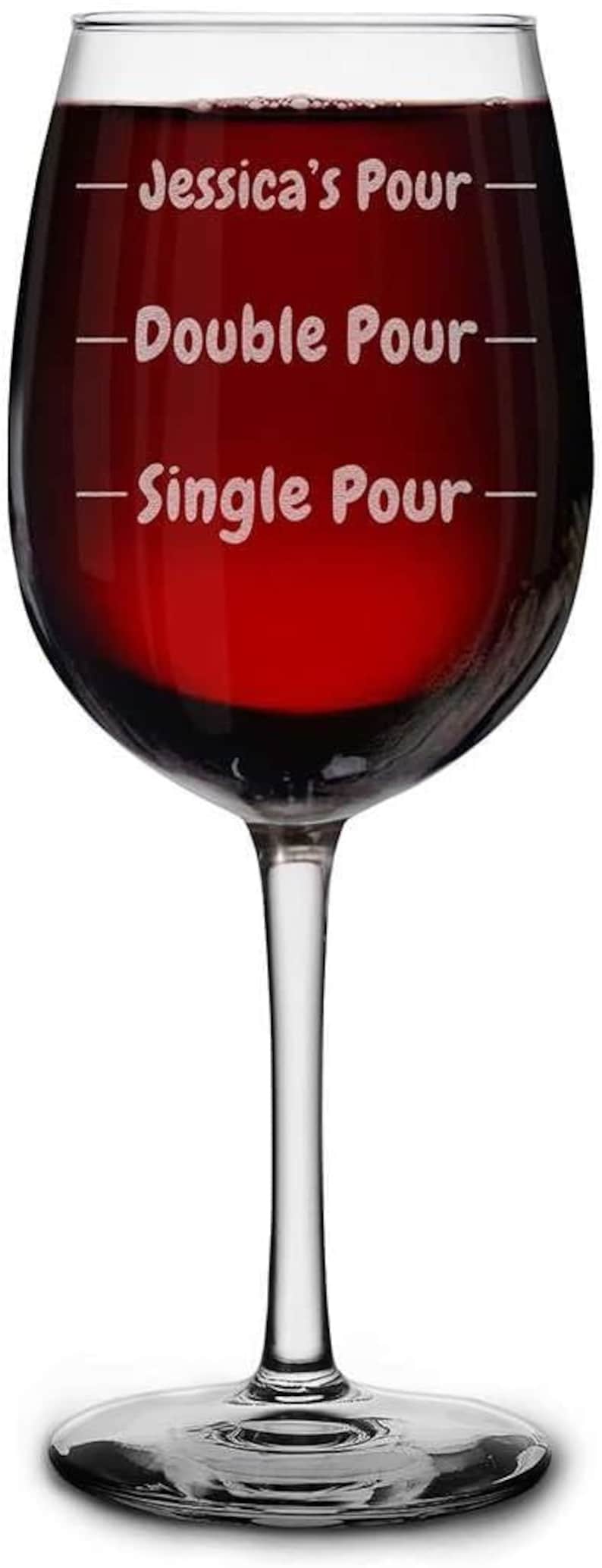 A custom 16oz stemmed wine glass engraved with your name and options for single or double pour. Perfect for wine lovers, this personalized wine glass makes an ideal gift for Christmas or any special occasion, offering a unique and thoughtful touch.