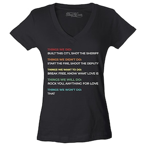May include: Black V-neck t-shirt with colourful text. The text includes phrases such as "Things We Did," "Things We Didn't Do," and "Things We Want to Do." The shirt has the Shop 4Ever logo.