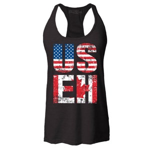 May include: Black tank top with a distressed graphic of the American and Canadian flags spelling out "US EH".