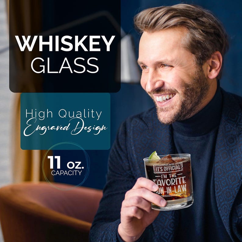 May include: A clear glass whiskey tumbler with an engraved design that reads "It's Official - I'm the Favorite Son-in-Law". The glass has a capacity of 11 ounces.