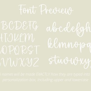 May include: Font preview showing the uppercase and lowercase alphabet in a white cursive font on a light green background. The text "Font Preview" is at the top of the image. The text "*All names will be made EXACTLY how they are typed into the personalization box, including upper and lowercase" is at the bottom of the image.