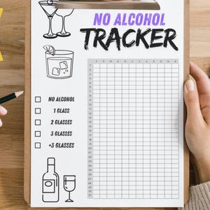 May include: A clipboard with a "NO ALCOHOL TRACKER" checklist. The tracker includes illustrations of cocktails and glasses, with options to track alcohol consumption. A yellow star-shaped graphic reads "KEEP TRACK OF HEALTHY HABITS". A laptop and pencil are also visible.