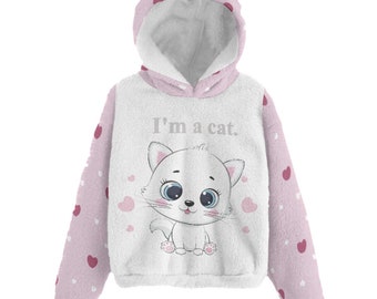 May include: A pink hooded sweatshirt with cat ears. The front of the sweatshirt has a white background with a cartoon cat and the text "I'm a cat."
