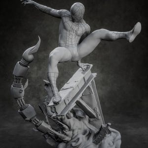 May include: A monochromatic gray resin figure of a superhero in a dynamic leaping pose, perched on a structural steel beam base with a mechanical scorpion tail element. The figure features a web-patterned suit and is labeled nomnom Figures.