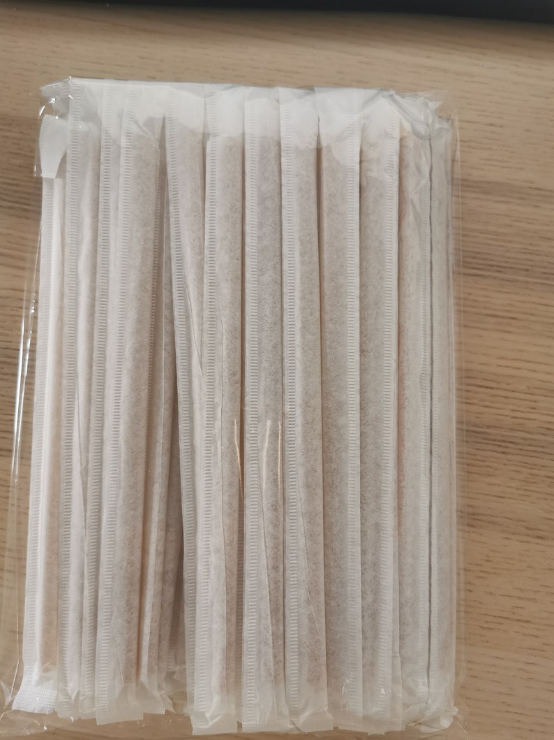 May include: A package of 25 brown paper straws wrapped in clear plastic.