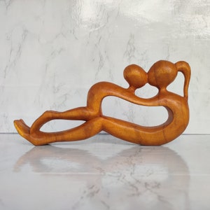 Wooden Abstract Sculpture of Mother Kissing Her Son