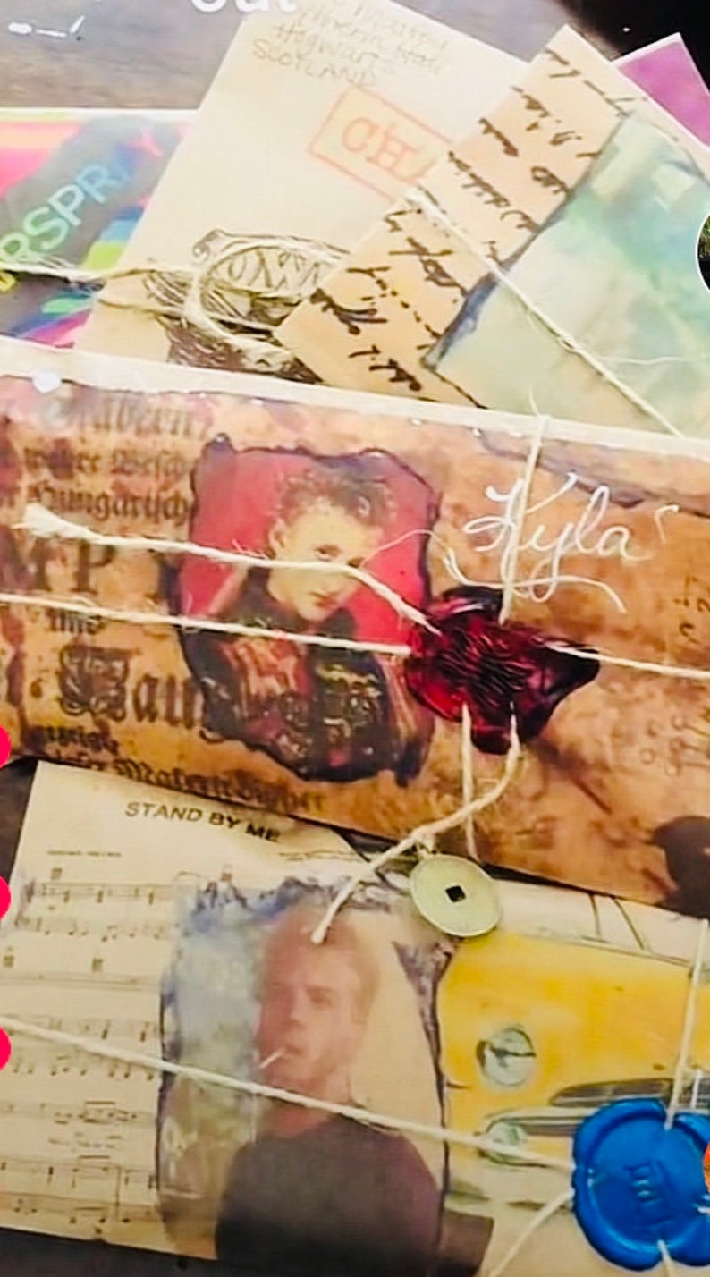 May include: A collection of vintage-style envelopes and papers tied with twine, featuring printed portraits, musical notation, and text including "Hogwarts Scotland" and "Stand By Me." The envelopes are sealed with red and blue wax seals and a metal coin.