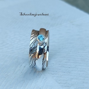 Spinring blauwe topaas: sterlingzilveren edelsteenring