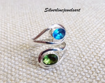 Anello in argento sterling fatto a mano con topazio blu e peridoto
