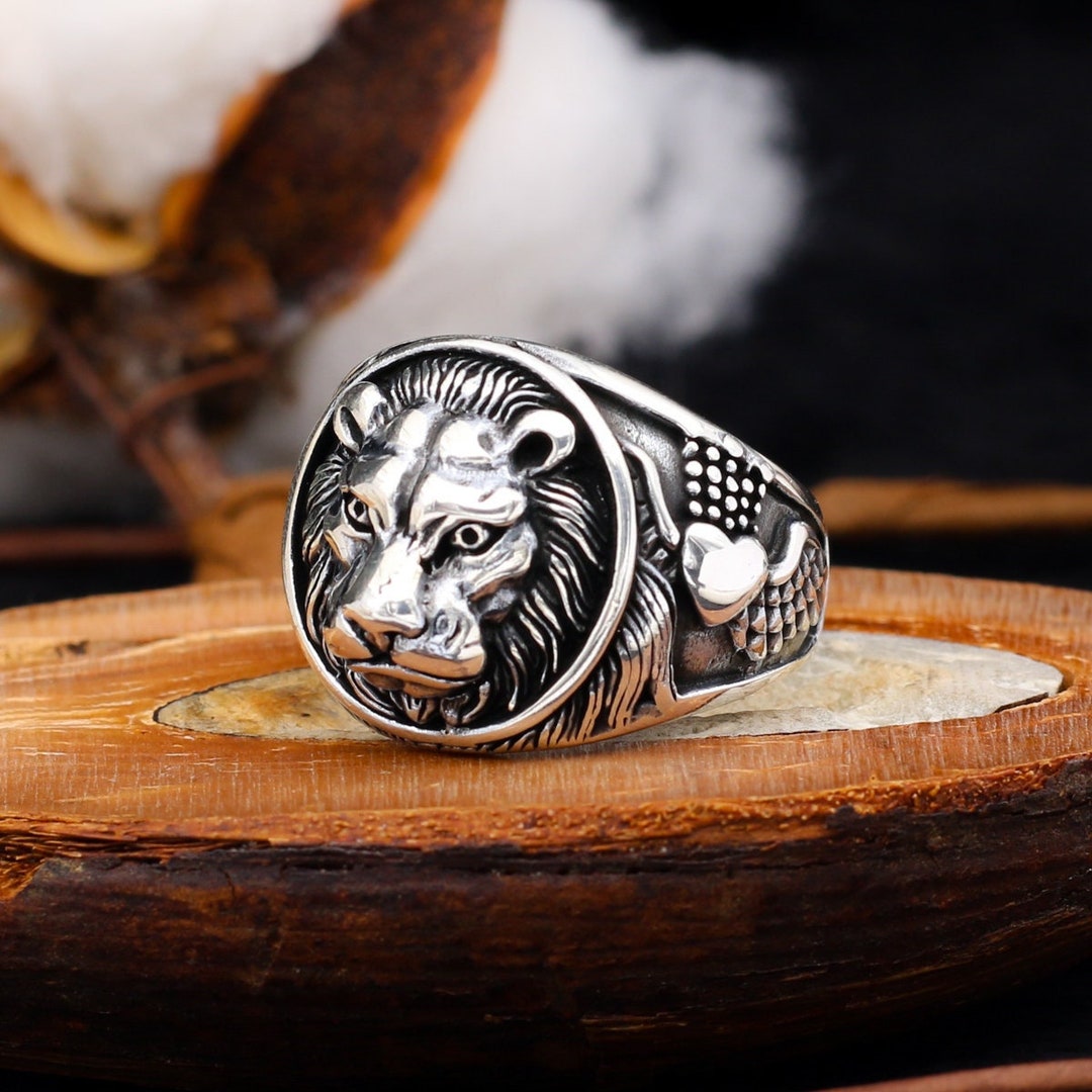 Sterling silver lion head ring with ruby and spinel - Kitsinian Jewelers