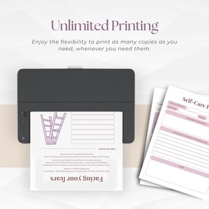 May include: A black printer printing a page with the text "Facing your fears" and a ladder graphic. The page also includes the text "FEAR I AM FACING" and a series of blank lines. Additional pages with the text "Self-Care Focus" are visible.