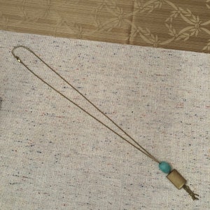 Vintage Gold Necklace with Sea Aquamarine Colored Faceted Stone Gold Tassel Costume Jewelry