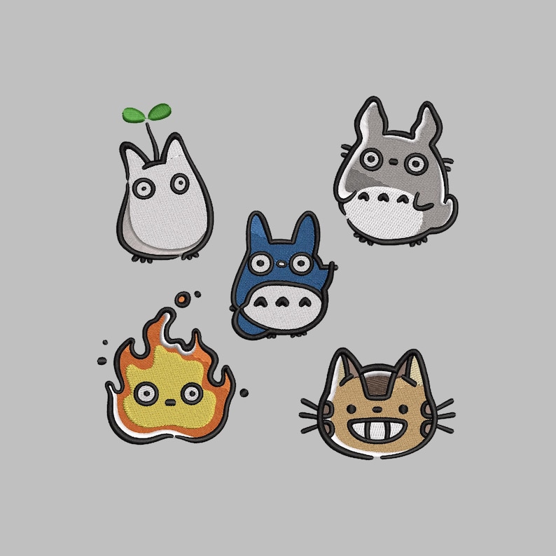 May include: Embroidered patches featuring five cartoon characters. The characters include a grey Totoro, a blue creature, a white creature with a sprout, a flame, and a cat-like character with a toothy grin. Each patch has a black outline.
