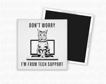 May include: Square magnet with a black and white illustration of a tabby cat sitting in front of a laptop screen. The text reads "DON'T WORRY I'M FROM TECH SUPPORT". The magnet is white with a black border.