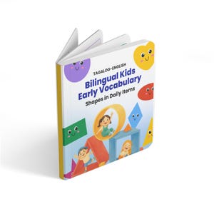 May include: A Tagalog-English bilingual board book titled Bilingual Kids Early Vocabulary Shapes in Daily Items. The cover features colourful cartoon shapes with smiling faces and illustrations of children interacting with geometric blocks and objects.