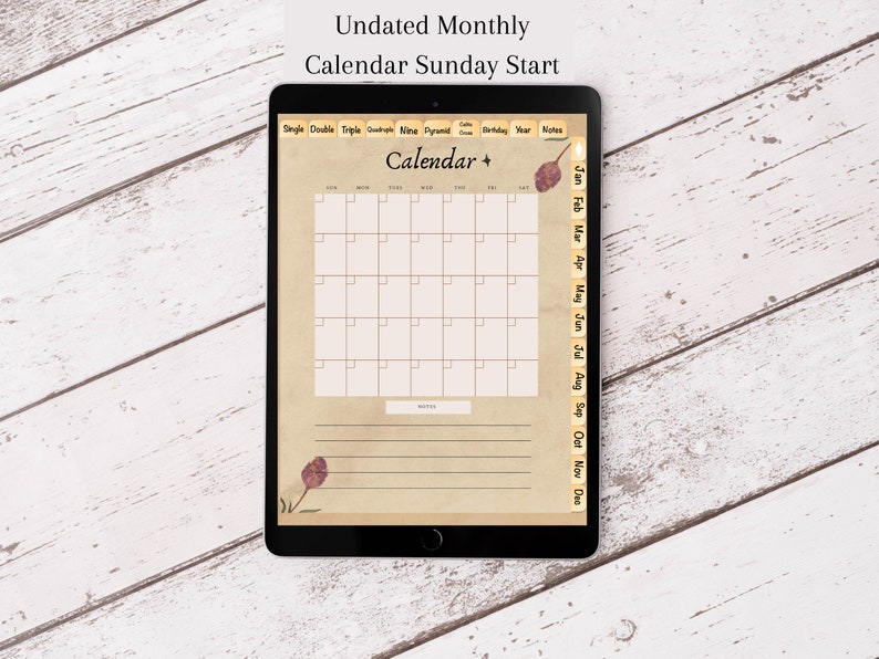 May include: A digital tablet displaying a blank monthly calendar template with a Sunday start. The calendar has a vintage aesthetic with a brown background and a decorative leaf design. The calendar is undated and includes a section for notes.