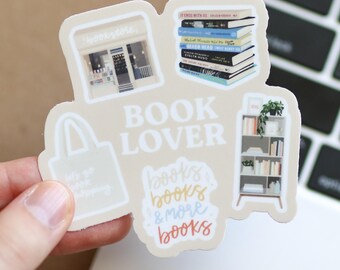 May include: A set of five stickers featuring a bookstore, a stack of books, a bookshelf, a tote bag, and the text "BOOK LOVER" and "books, books & more books".