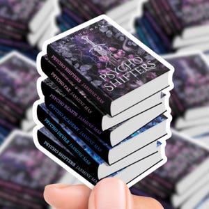 May include: A stack of stickers featuring book covers with the title "Psycho Shifters" and author Jasmine Mas. The top sticker has a dark floral design with a sword. Other titles include "Psycho Fae", "Psycho Beasts", "Psycho Academy", and "Psycho Devils".