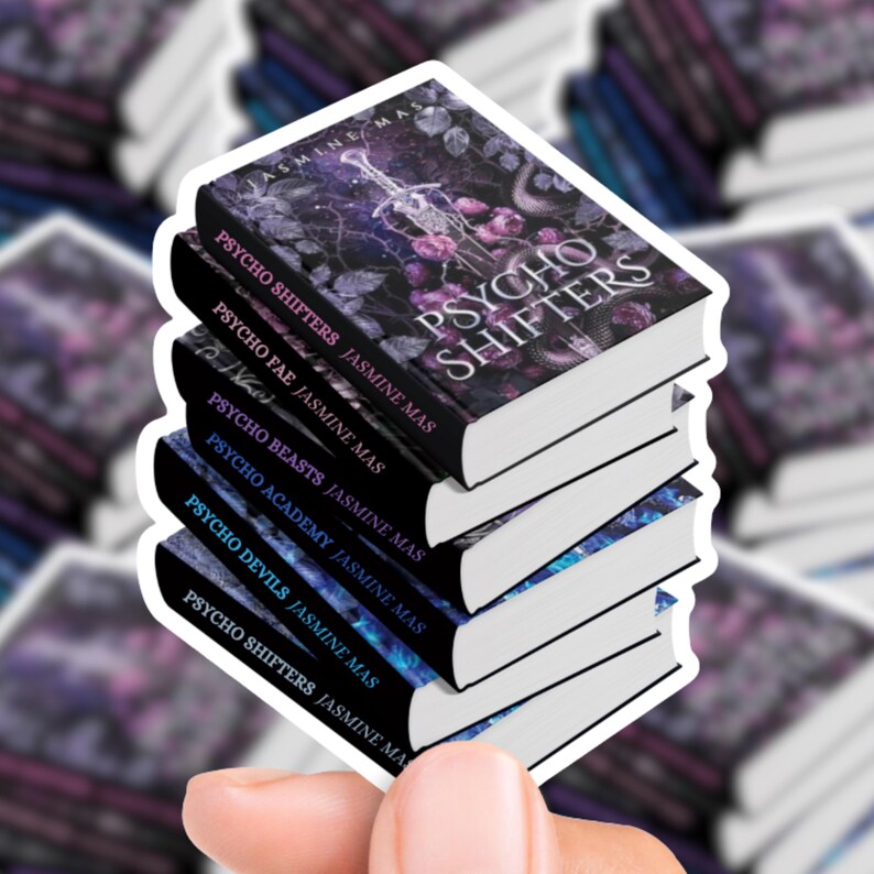 May include: A stack of stickers featuring book covers with the title "Psycho Shifters" and author Jasmine Mas. The top sticker has a dark floral design with a sword. Other titles include "Psycho Fae", "Psycho Beasts", "Psycho Academy", and "Psycho Devils".