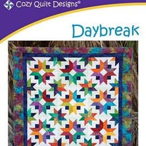 May include: A quilt pattern called "Daybreak" designed by Georgette DelfOrco. The pattern is for a quilt made with 2 1/2 inch strips and includes instructions for baby, lap, throw, twin, queen, and king sizes.