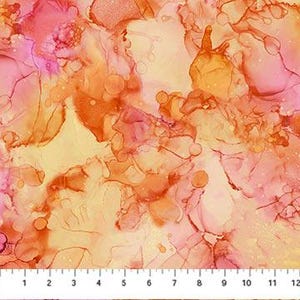 May include: Abstract fabric with a watercolor effect in shades of orange, pink, and yellow. The design features flowing, blended colors with a marbled appearance. A ruler is at the bottom, showing measurements in inches.
