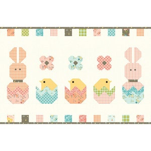 May include: A patchwork quilt featuring a whimsical Easter scene with bunnies, chicks, and flowers. The quilt is made with a variety of colorful fabrics and patterns.