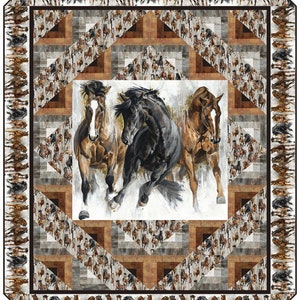 May include: A quilt featuring a central image of three running horses in shades of brown and black. The quilt has a geometric pattern with a repeating horse motif and a brown border.