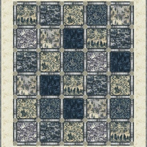 May include: A quilt with a repeating pattern of blue and beige squares. Each square features a different woodland scene with trees, mountains, and animals.