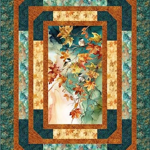 May include: A quilted wall hanging with a central image of autumn leaves and small birds. The quilt features a teal, brown, and gold color scheme. The border has a leaf pattern.