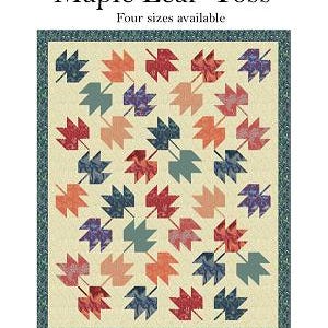 May include: A quilt pattern titled Maple Leaf Toss by Fat Quarter Patterns. The design features a cream background with a repeating pattern of maple leaves in shades of red, orange, blue, and teal, enclosed by a dark teal patterned border.