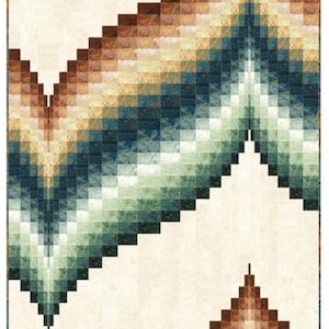 May include: A quilt pattern with a symmetrical design featuring a gradient of brown, green, and blue colors. The pattern is made up of small squares arranged in a geometric pattern.