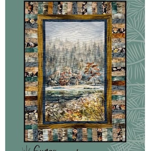 May include: A quilt with a landscape scene framed by a gold and blue border. The quilt features a forest and a small cabin. The words "On Key" are at the top, and "Sugar Pine Quilt Designs for Villa Rosa Designs" are at the bottom.