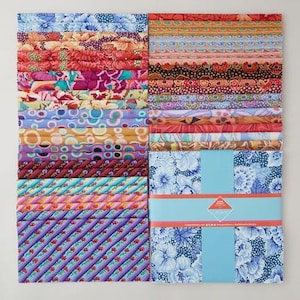 May include: A collection of colorful fabric squares and strips. The fabrics feature floral, geometric, and abstract patterns in shades of blue, pink, orange, and purple. Some are bundled with a light blue band.