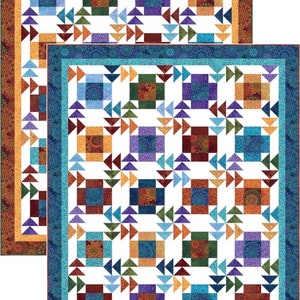 May include: Two colorful quilts with intricate patchwork designs. Each quilt features a white background with squares and triangles in shades of blue, green, purple, orange, and brown. The borders have decorative patterns.