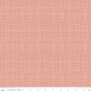 May include: A close-up of fabric with a woven texture. The fabric has a light peach color with a grid pattern of thin, darker peach lines. The bottom of the image shows a ruler with inches and the text "Riley Blake Designs".