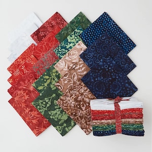 May include: A collection of fabric squares in various colors and patterns, including red, green, blue, and brown. The fabrics feature floral and abstract designs. A stack of folded fabric squares is tied with a red ribbon.