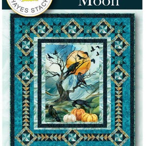 May include: A quilt with a teal and patterned border, featuring a central image of a tree with crows, pumpkins, and a full moon. The quilt measures 64" x 72". The words "Harvest Moon" are displayed at the top.