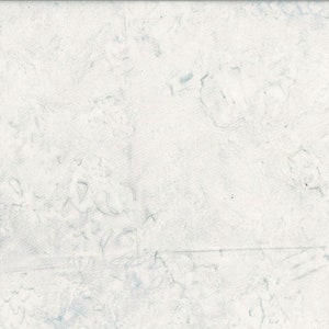May include: A white textured background with faint blue markings.
