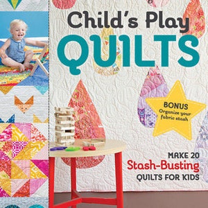 May include: A book cover with the title "Child's Play Quilts" and a colorful quilt design. The book features 20 quilt patterns for kids and includes a bonus section on organizing fabric.