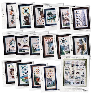 May include: A collection of rectangular quilt patterns from the True North Collection, featuring various wildlife and nature themes like fox, bear, beaver, camper, caribou, chickadee, compass, eagle, hiker, kayak, lynx, moose, owl, signpost, tent, and wolf.