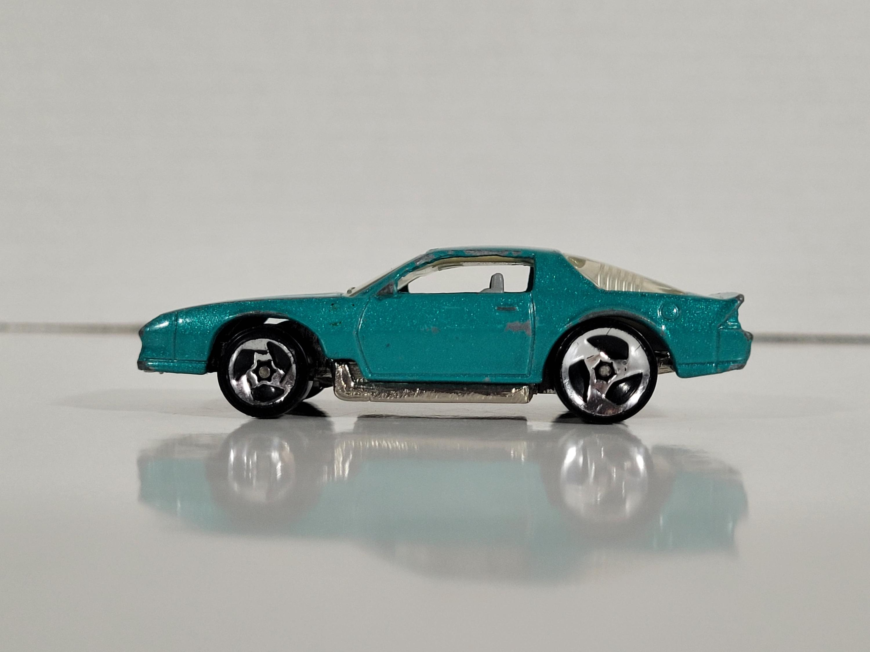 Vintage 1983 Chevy Camaro Z28 Die-cast Toy Car 1:64 Teal Color
