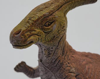 Vintage 1992 U.K.R.D. Parasaurolophus Dinosaur figure made of PVC plastic. 
