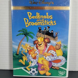 May include: A DVD case for Walt Disney's "Bedknobs and Broomsticks" 30th Anniversary Edition. The cover has a blue background with illustrations of characters and the film's title in yellow and orange. The Disney DVD logo is visible.