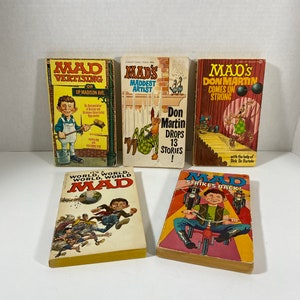 Stare książki MAD w miękkiej oprawie – wybór: Madvertising, Maddest Artist Mad, Don Martin Mad…, Mad Strikes Back i It’s A World, World Mad