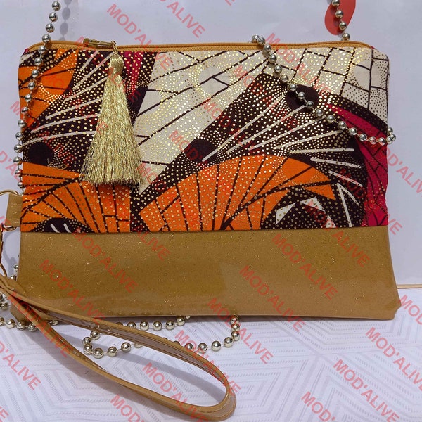 Pochette wax orange écru et simili cuir pailleté doré