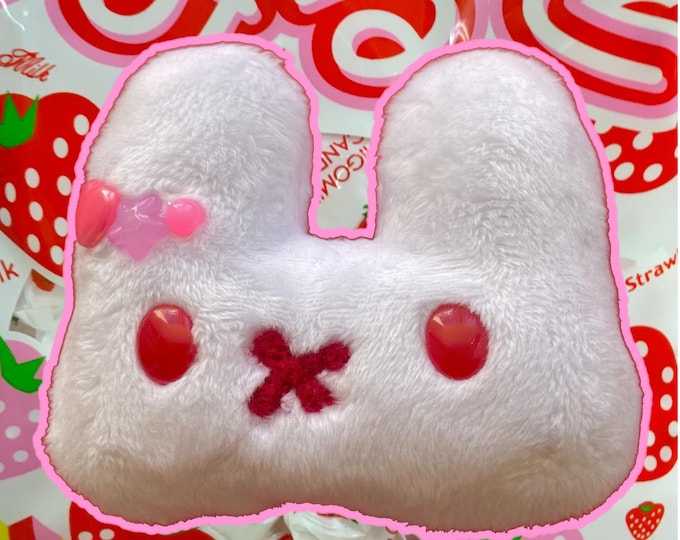 white strawberry plush bunny charm