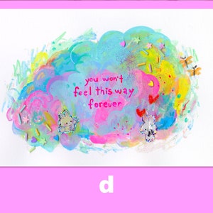 May include: A colorful abstract painting with a cloud shape in the center. The cloud is painted in shades of blue, pink, and yellow. The text "you won't feel this way forever" is written in pink on the cloud. The painting is decorated with glitter, stars, and small hearts.