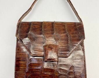 crocodile print purse