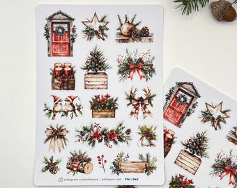 Puede incluir: Hoja de pegatinas con temática navideña con ilustraciones en acuarela de elementos festivos. Los diseños incluyen una puerta roja con una corona, estrellas, adornos, árboles de Navidad y lazos decorativos.